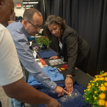 Attendees learning about Baltimore's high-tech textile industry.